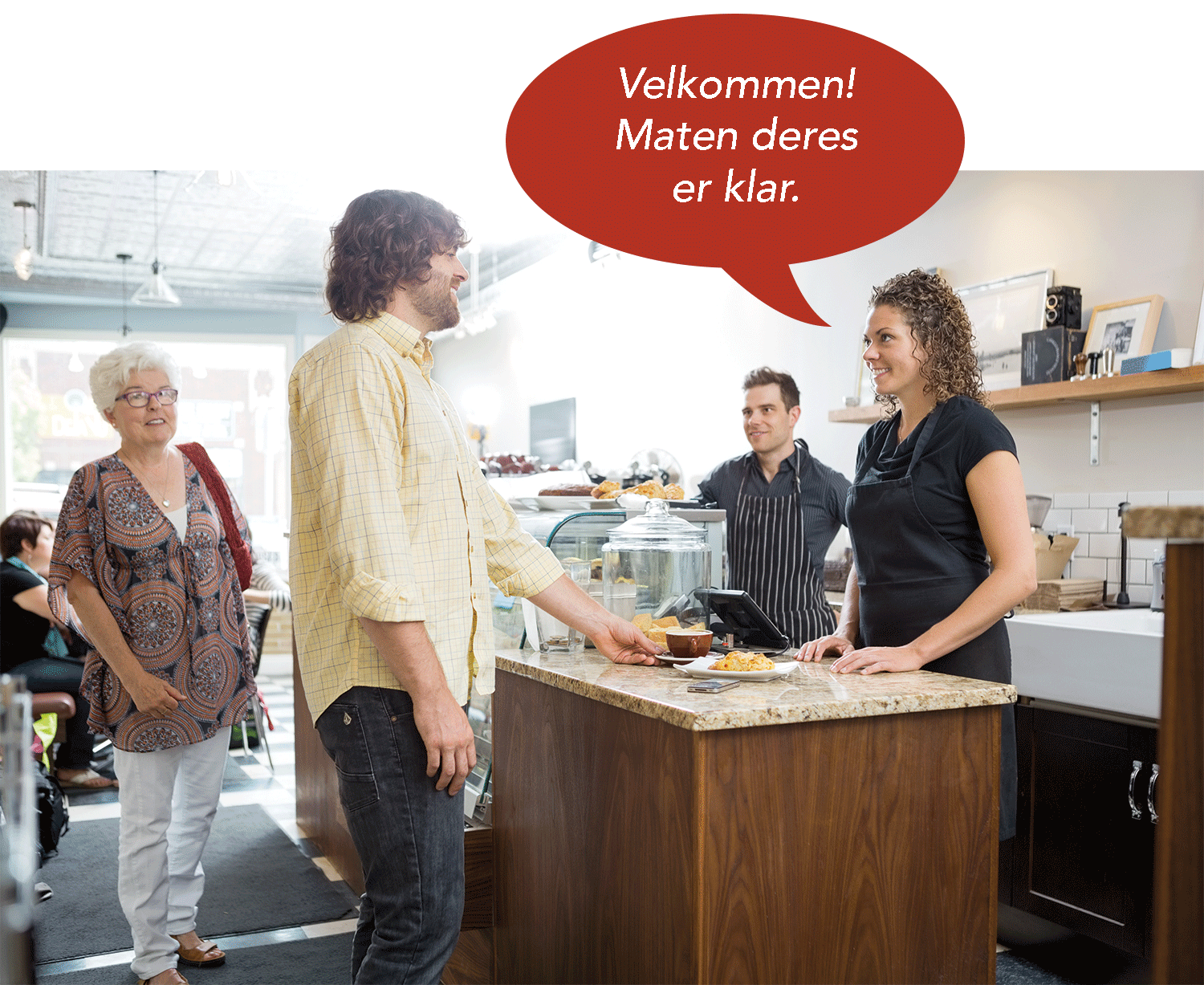 Servitør ønsker velkommen